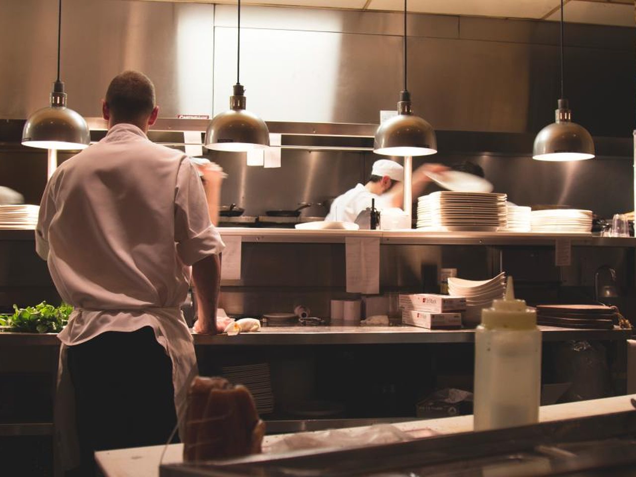 Stainless steel commercial restaurant kitchen, the setting for a documented commercial pest program